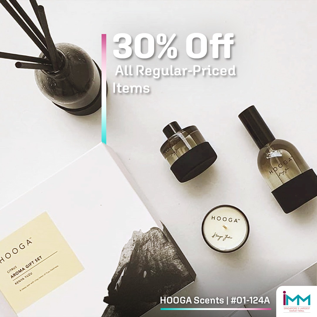An inviting display of home decor items at a HOOGA store, featuring soft furnishings and stylish accessories.