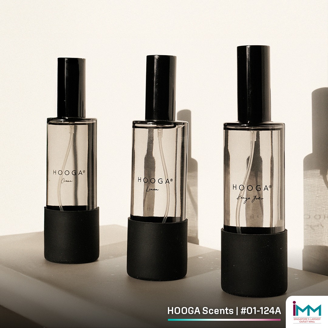 HOOGA car fragrance discreetly placed in a vehicle's interior.