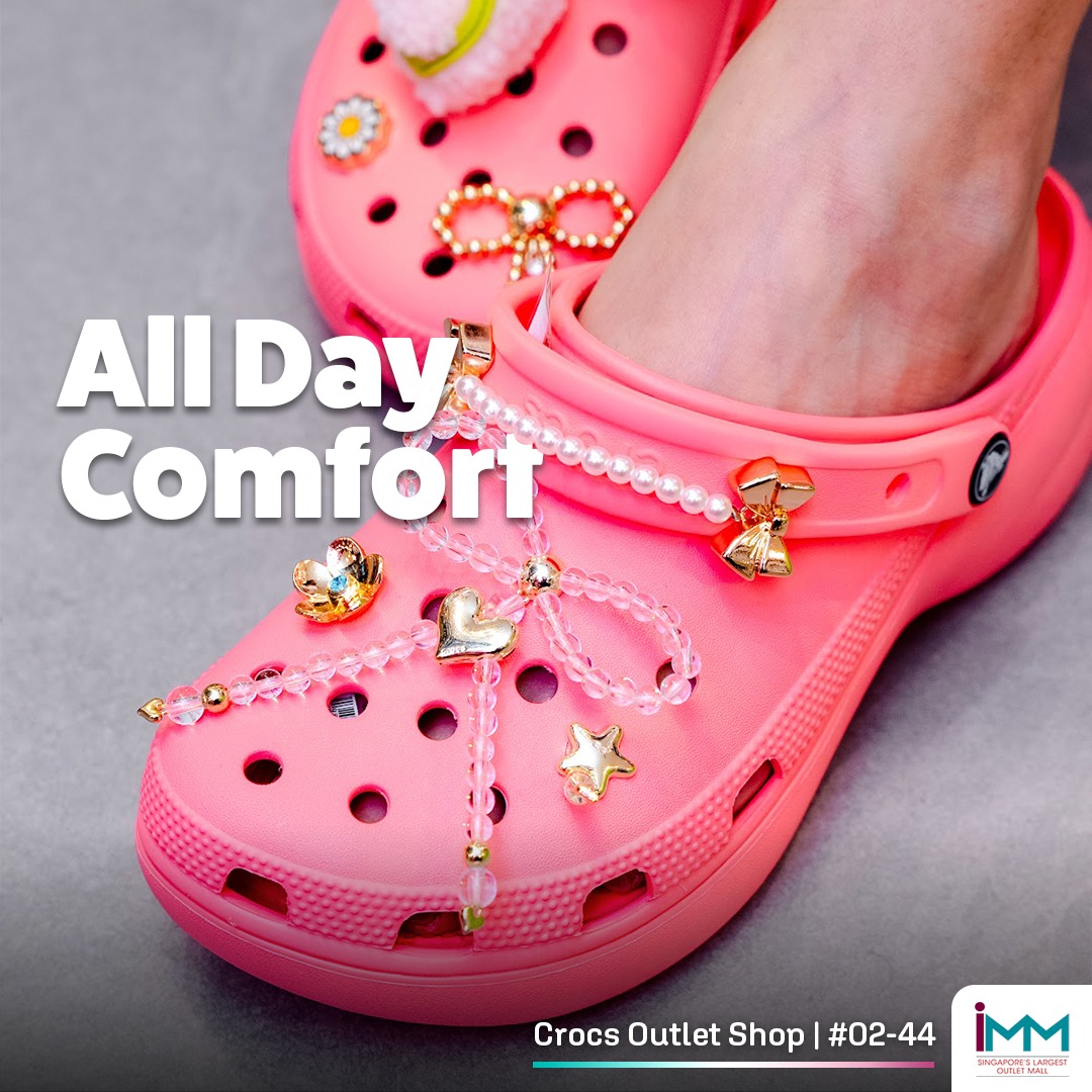 A collection of colorful Crocs clogs and customizable Jibbitz charms