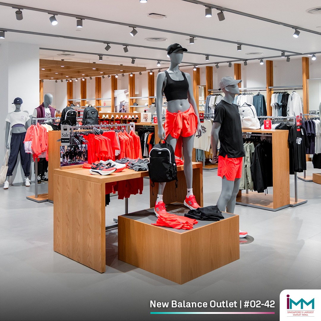 A wide selection of New Balance athletic shoes and gear on display