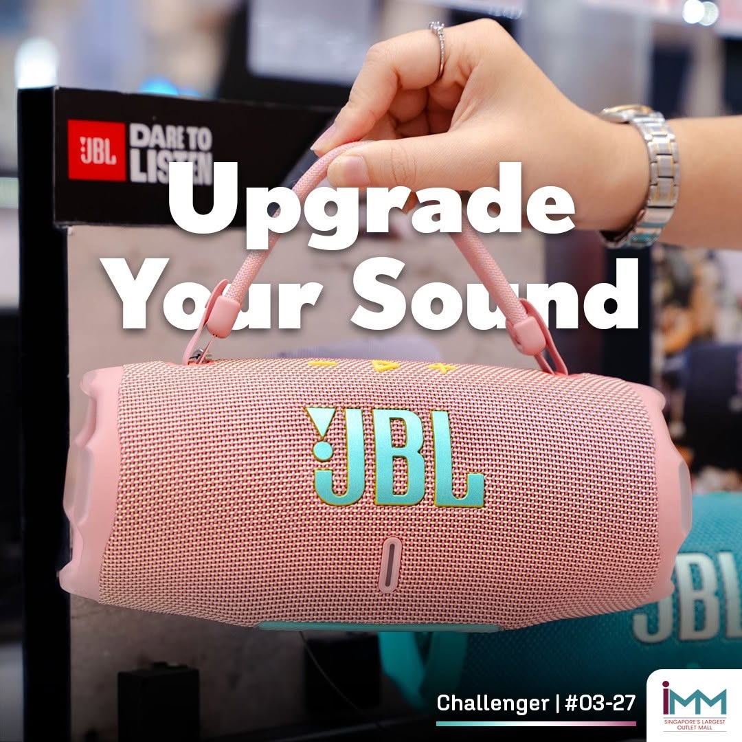 JBL portable Bluetooth speaker on display at Challenger IMM with Dare to Listen slogan