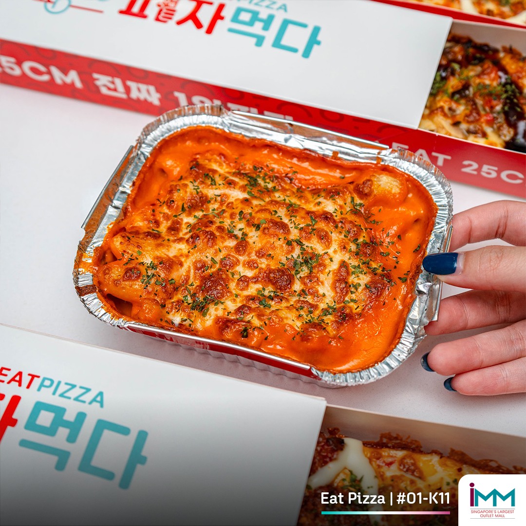 An assortment of gourmet pizzas and side dishes from Eat Pizza Singapore