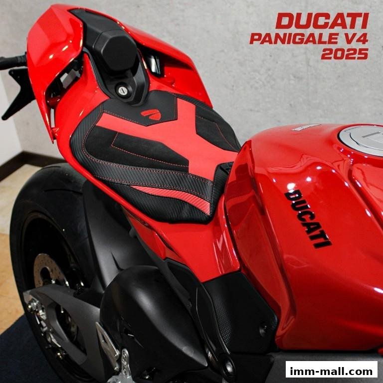 Close-up of a red Ducati Panigale V4 2025 motorcycle seat and fuel tank.