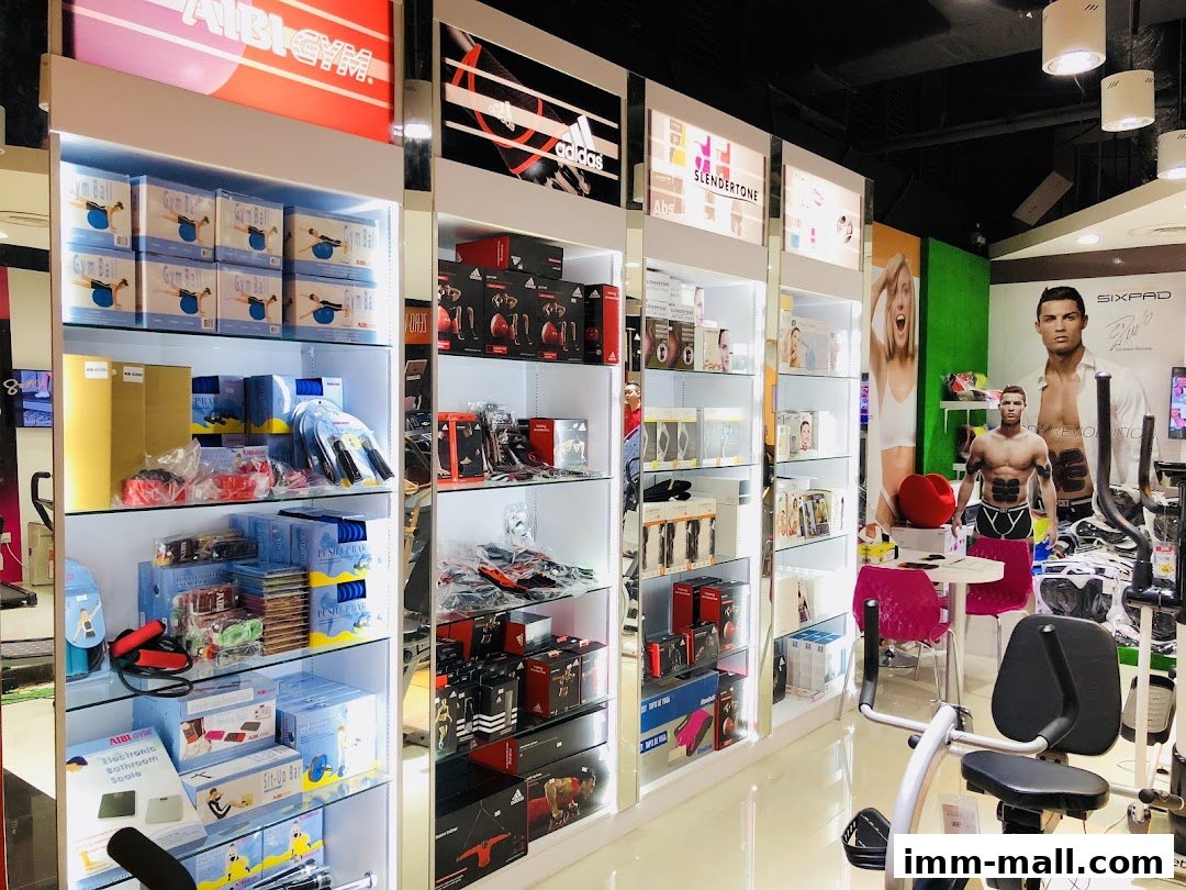 Interior view of a fitness equipment store showcasing various exercise products and brands.