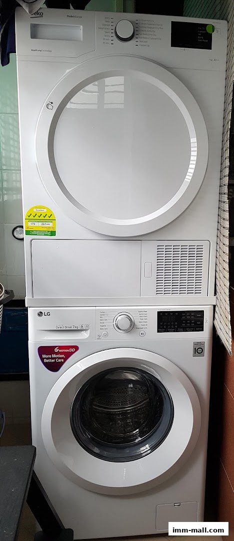 A stacked Beko dryer and LG washing machine with various wash cycle options visible.