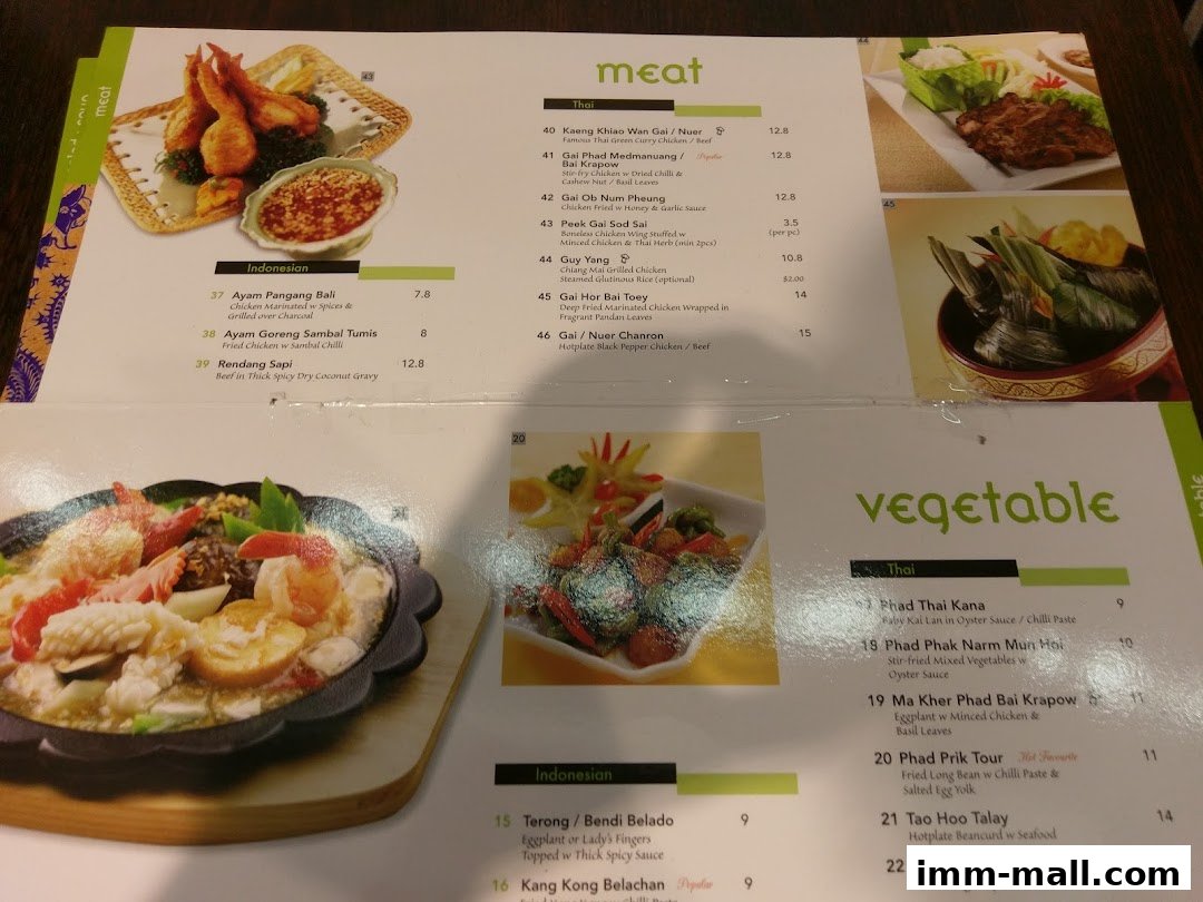 A menu from Bali Thai IMM featuring Thai and Indonesian dishes with food photography.