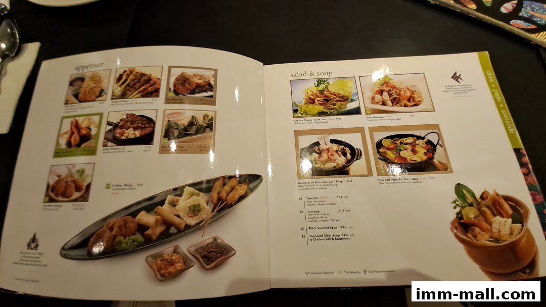 A menu from Bali Thai IMM featuring appetizers, salads, and soups with enticing food photography.