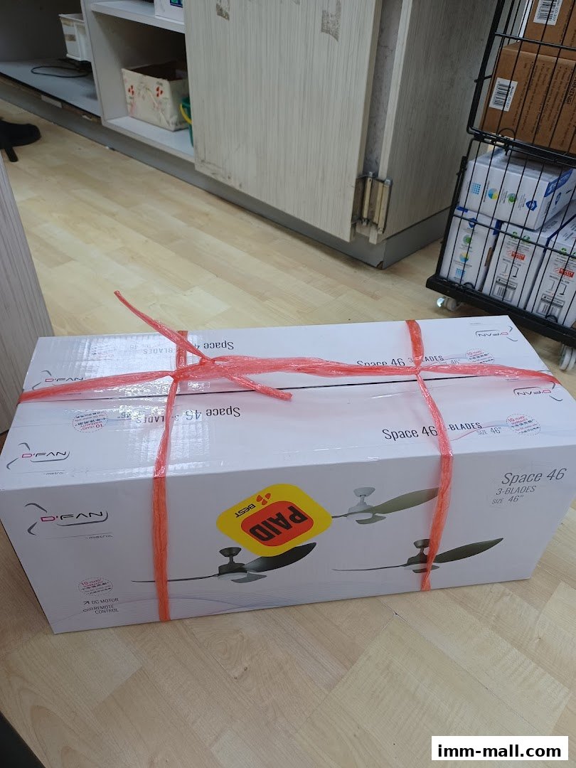 A box for a D'FAN Space 46 ceiling fan, secured with red ties, with a 'PAID' sticker.