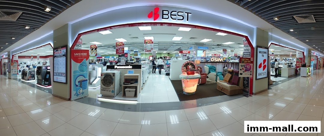 The Best Denki electronics store entrance with various appliances and displays.