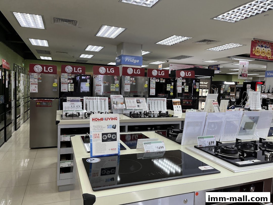 Interior view of an electronics store showcasing refrigerators and kitchen appliances.