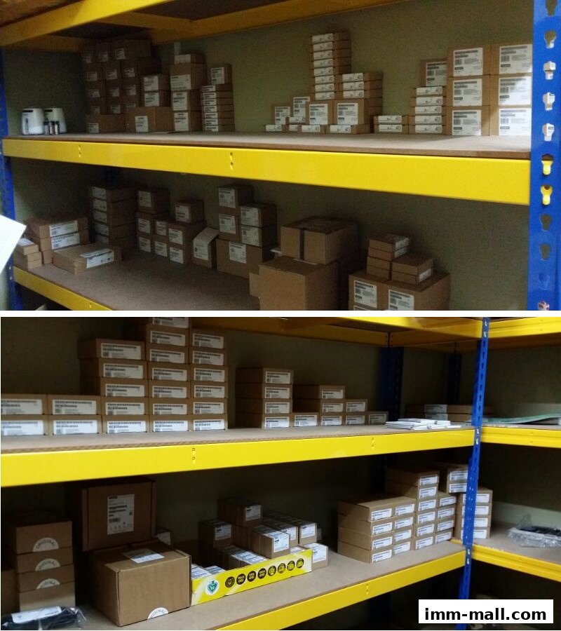 Shelves stocked with numerous boxes of electronic components and supplies.
