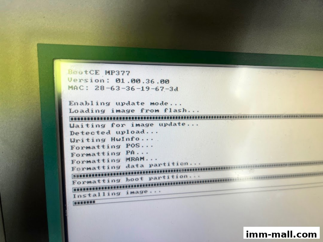 A screen displaying the BootCE MP377 software update process with progress indicators.