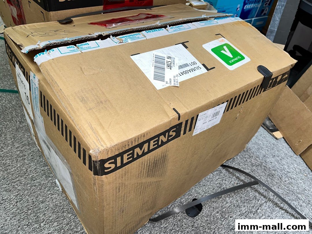 A large cardboard box with the Siemens logo and shipping labels.