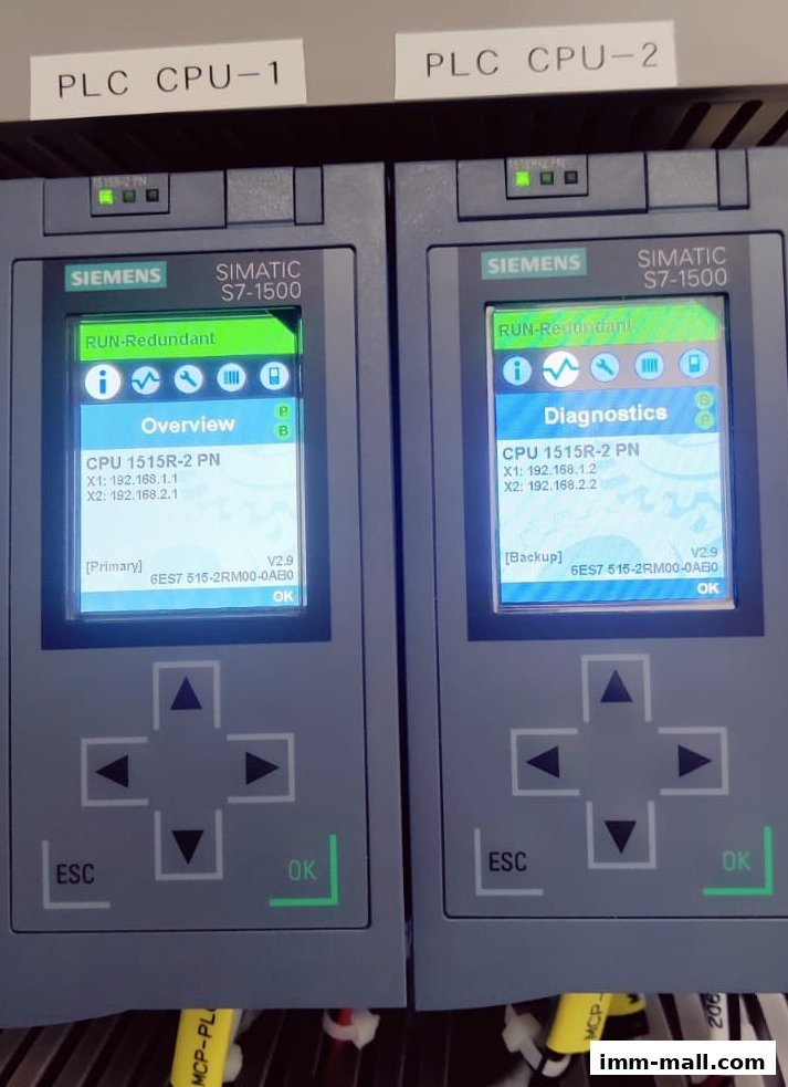 Close-up of two Siemens SIMATIC S7-1500 PLC CPUs in a redundant configuration.