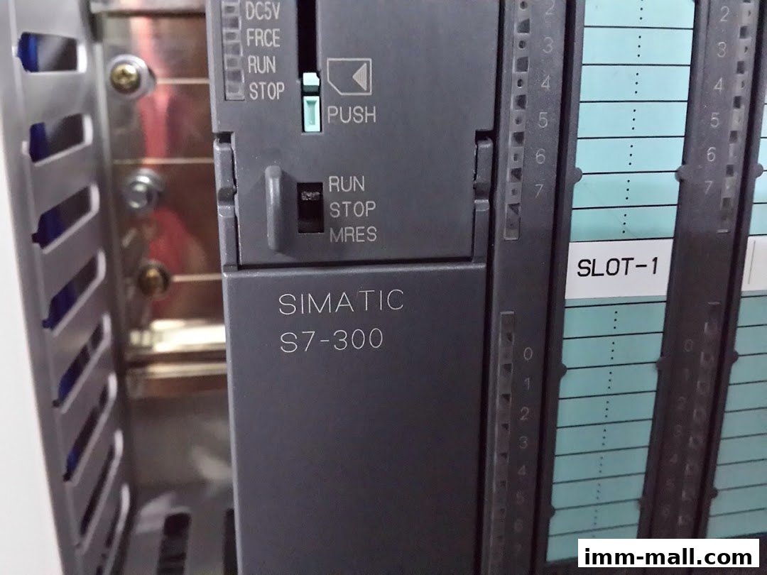 Close-up of a SIMATIC S7-300 industrial automation controller with slot indicators.