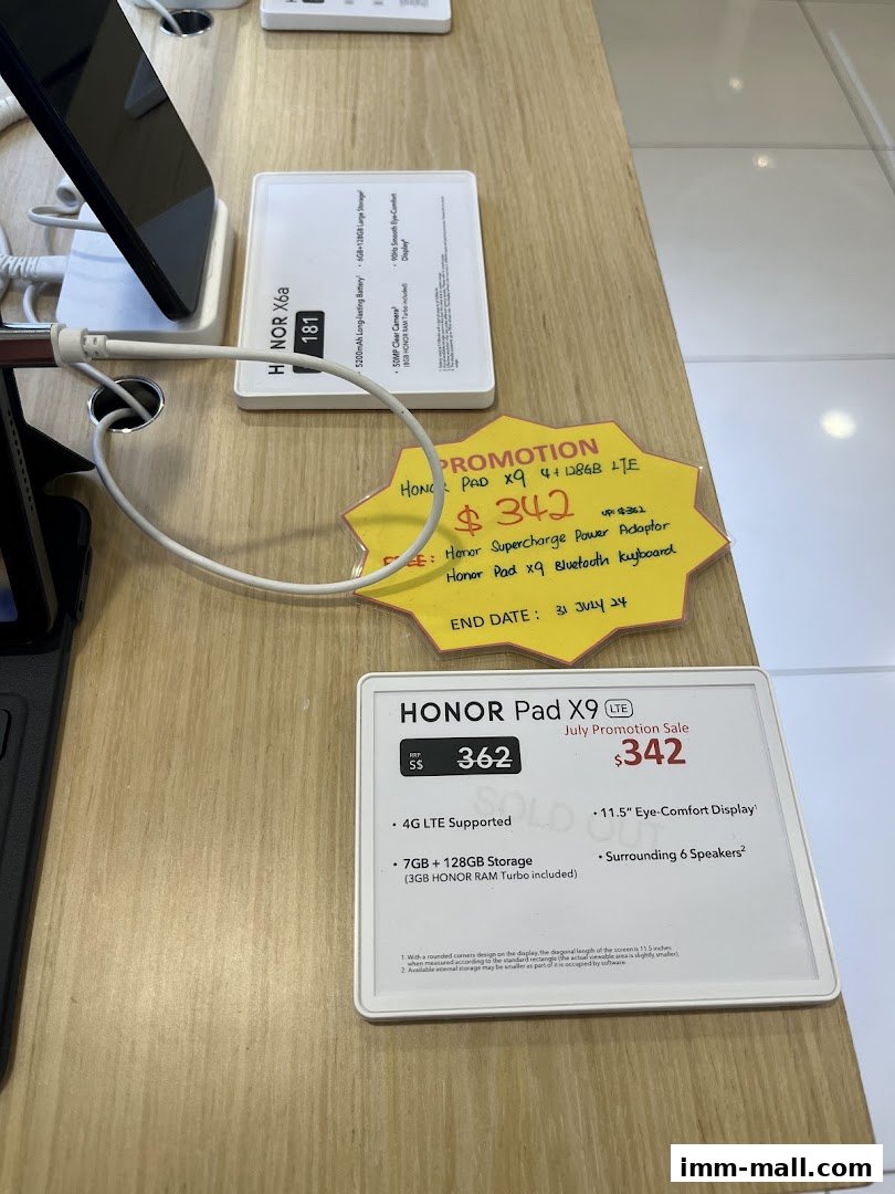Promotional display for Honor Pad X9 with pricing and features highlighted.