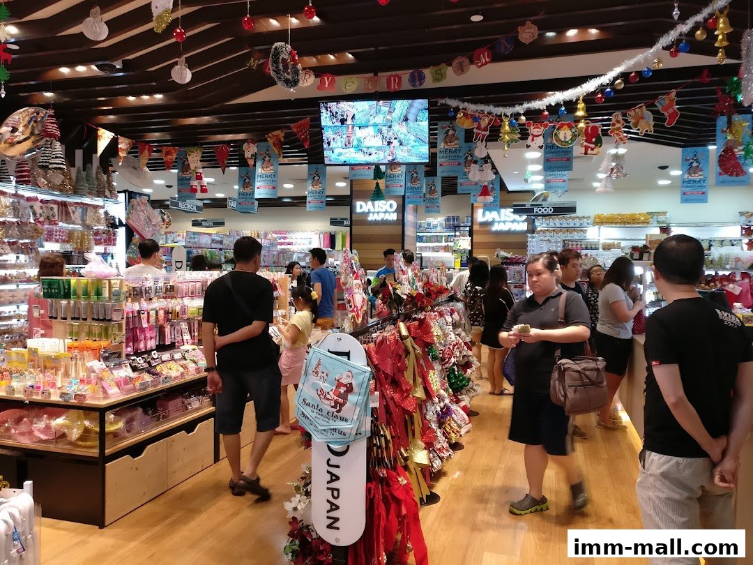 Interior view of a DAISO store with customers browsing merchandise and festive decorations.