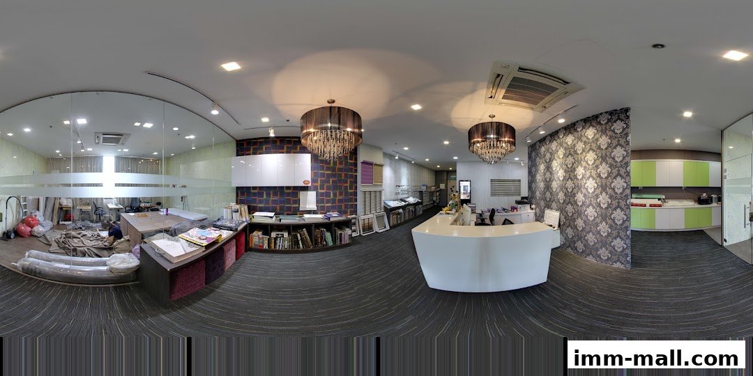 Interior view of a shop showcasing blinds, wallpaper, and fabric samples with a reception desk.