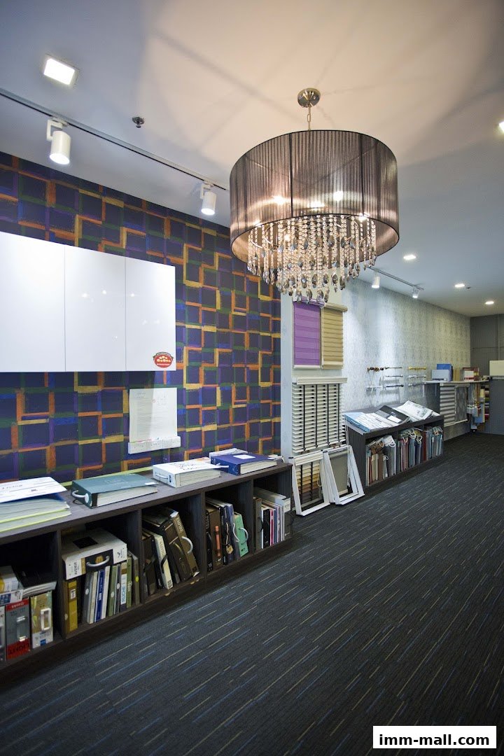 Interior of a shop displaying blinds, fabric samples, and decorative items.