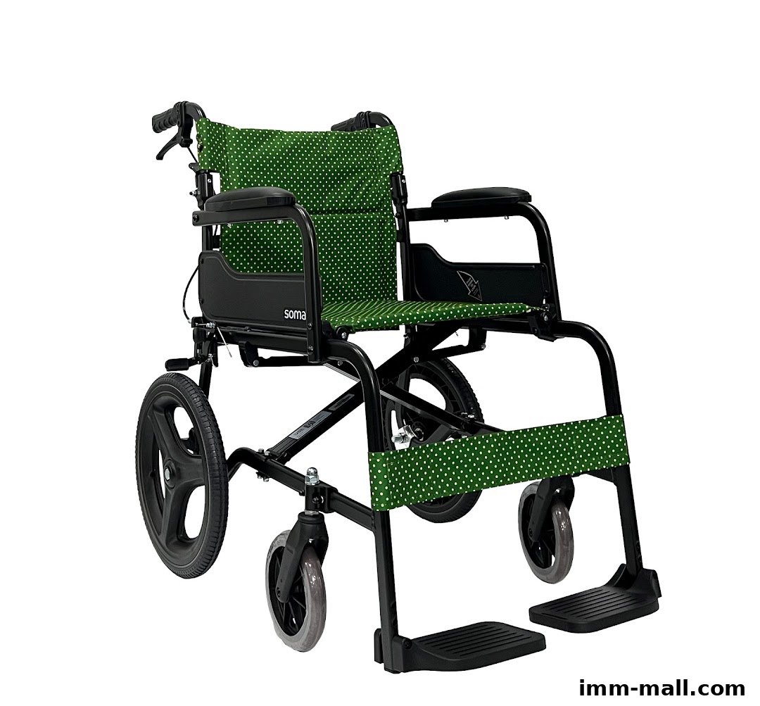 A green polka dot wheelchair with black frame and wheels, isolated on a white background.