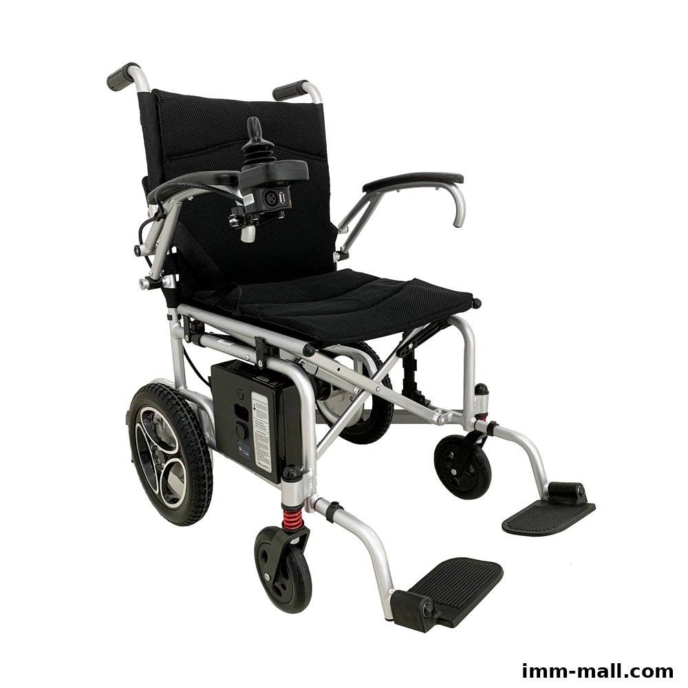 A black electric wheelchair with a joystick control and footrests, isolated on a white background.