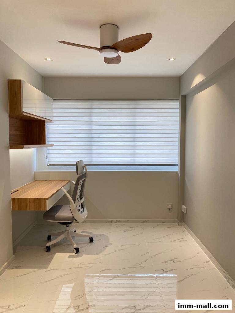 A modern home office setup with a floating desk, ergonomic chair, and ceiling fan.
