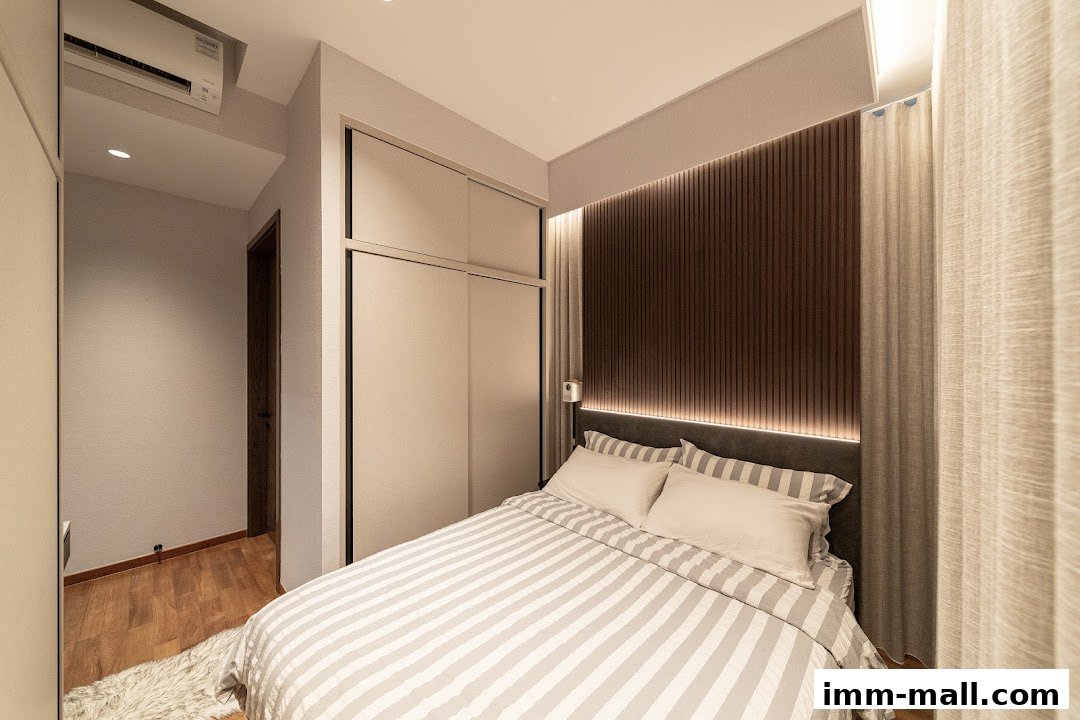 A modern bedroom interior with a bed, wardrobe, and air conditioning unit.