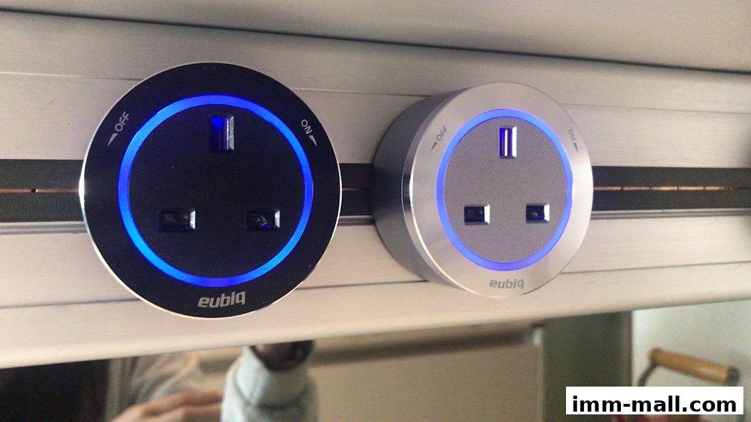 Two Eubiq power outlets, one black and one silver, with blue LED lighting.
