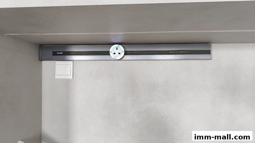 A close-up of a modern electrical outlet system with a light indicator.