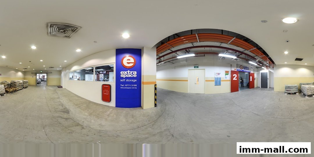 Interior view of Extra Space Self Storage with signage, storage units, and reception area.
