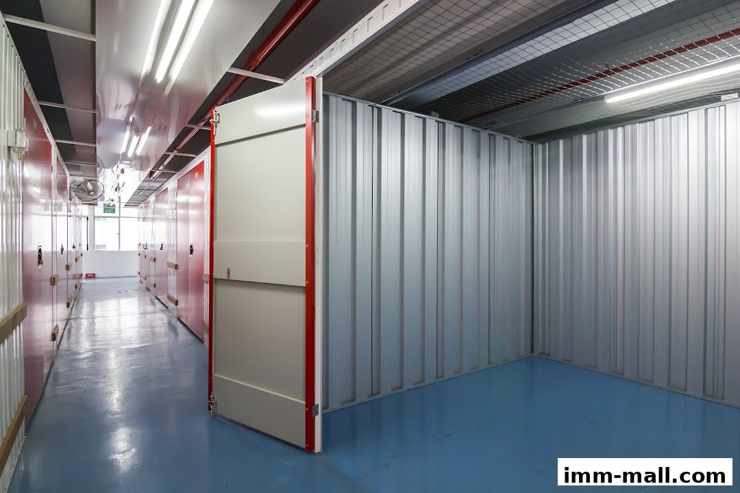 Interior view of a storage facility with multiple units and an open door.