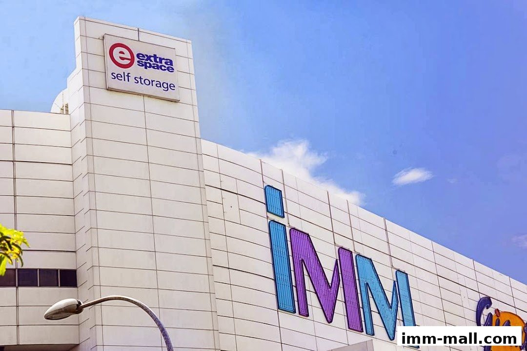 Exterior view of the IMM building with Extra Space Self Storage signage.