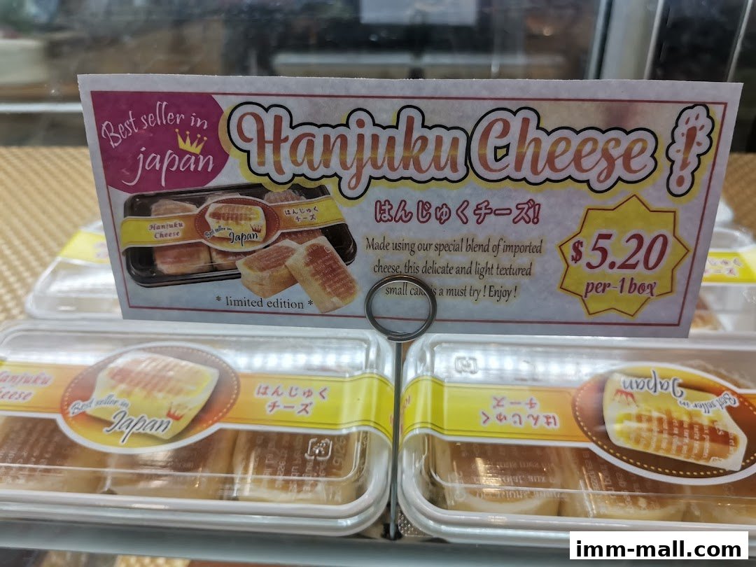 A sign advertising Hanjuku Cheese, a best-seller in Japan, priced at $5.20 per box.