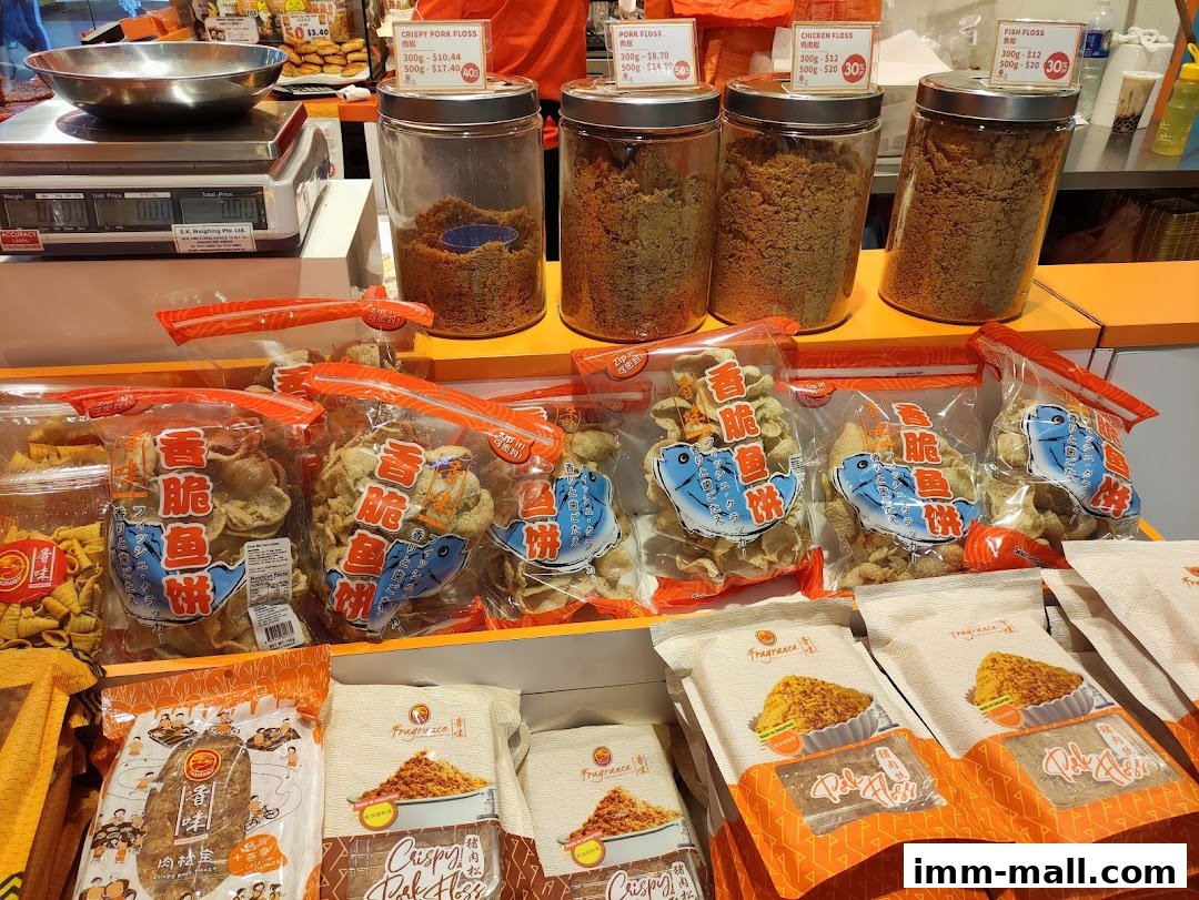 A display of various packaged meat floss and crispy fish crackers from Fragrance Bakkwa.
