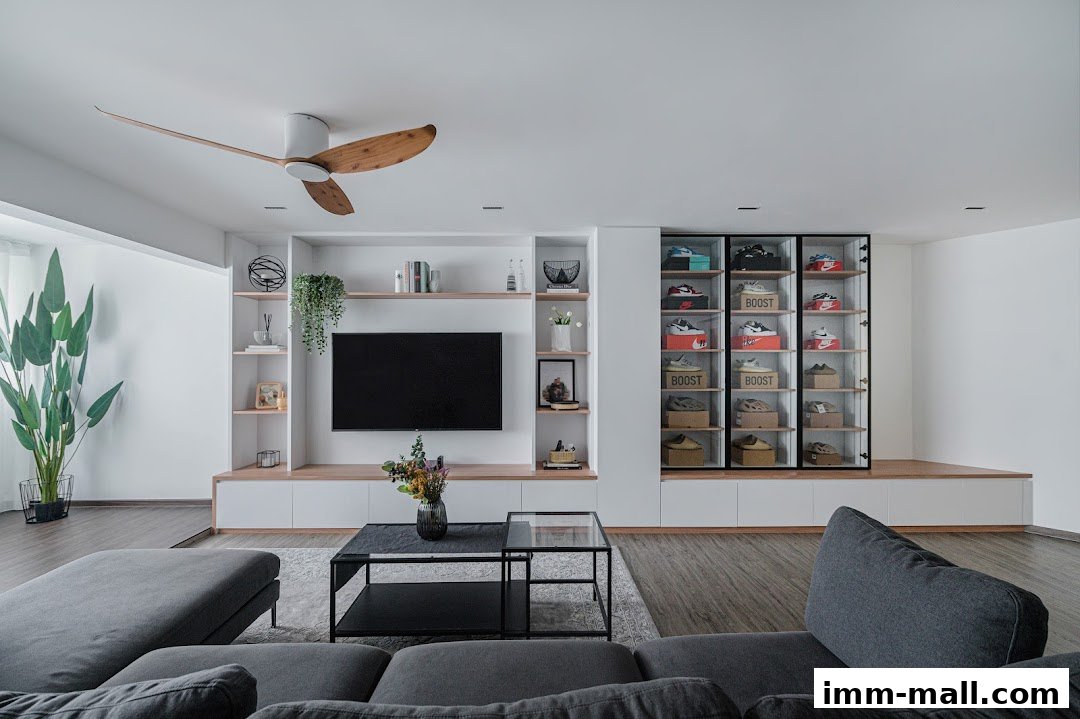 A modern living room with a TV, display shelves, and a shoe collection cabinet.