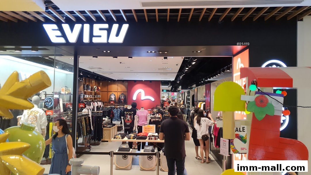 Interior view of the Evisu clothing store with merchandise and customers.