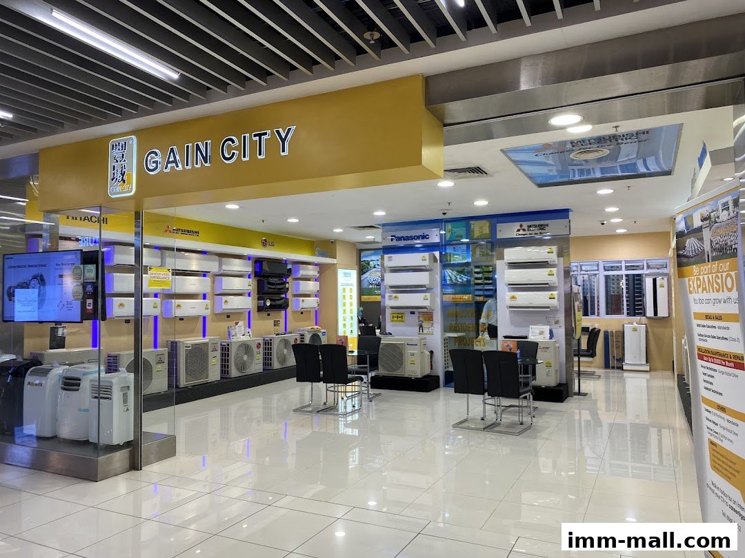 Interior view of Gain City electronics store showcasing air conditioners and other appliances.