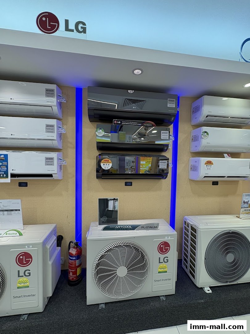 Display of LG air conditioners, including indoor and outdoor units, with prominent branding.