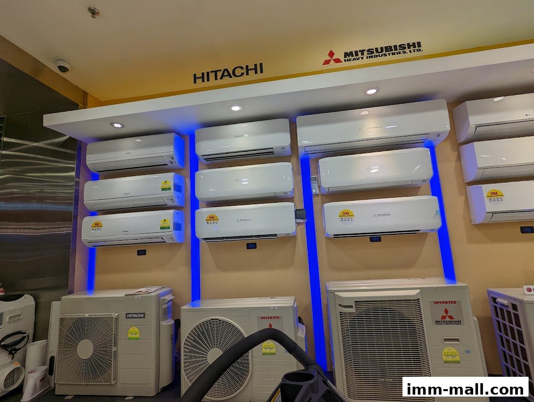 Display of various air conditioning units from brands like Hitachi and Mitsubishi.