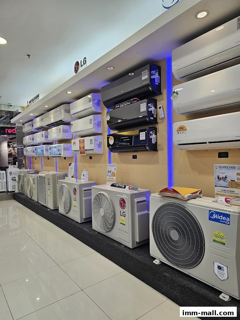 A display of various air conditioning units, including indoor and outdoor units from brands like LG and Midea.