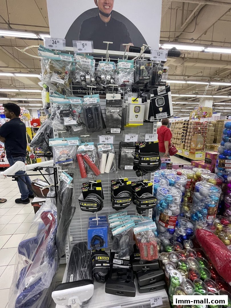 A display of bicycle accessories and Christmas ornaments in a supermarket.