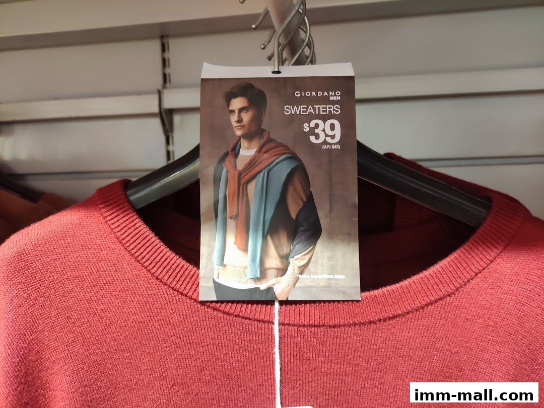 A red sweater with a Giordano Men's sweaters tag showing a model and price.
