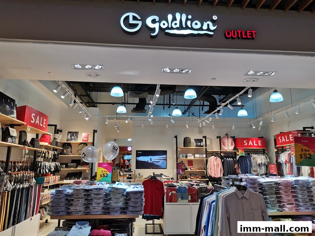 The Goldlion Outlet store displays shirts, bags, and accessories with prominent 'SALE' signs.