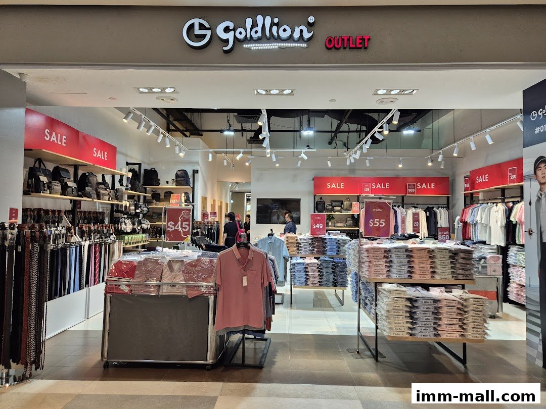 The Goldlion Outlet store displays various men's apparel, including shirts, belts, and bags, with prominent sale signs.