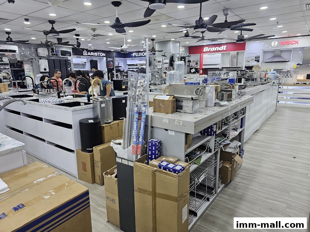 Interior view of a hardware showroom with various appliances and fixtures on display.