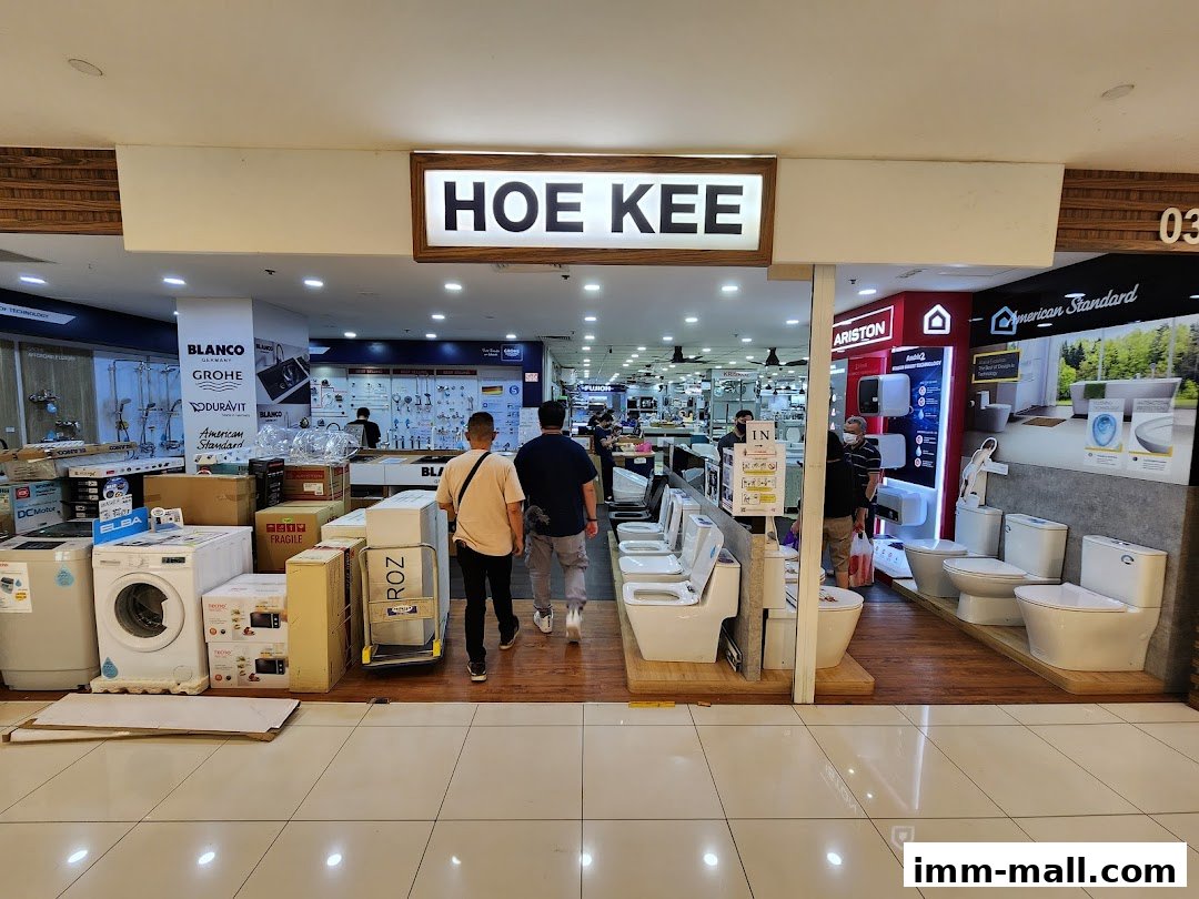 The entrance to Hoe Kee Hardware Pte Ltd showroom, displaying various bathroom fixtures and appliances.