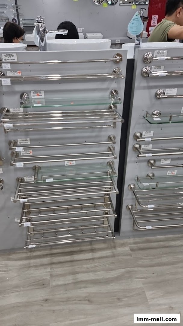 Display of various bathroom towel racks and shelves made of stainless steel.