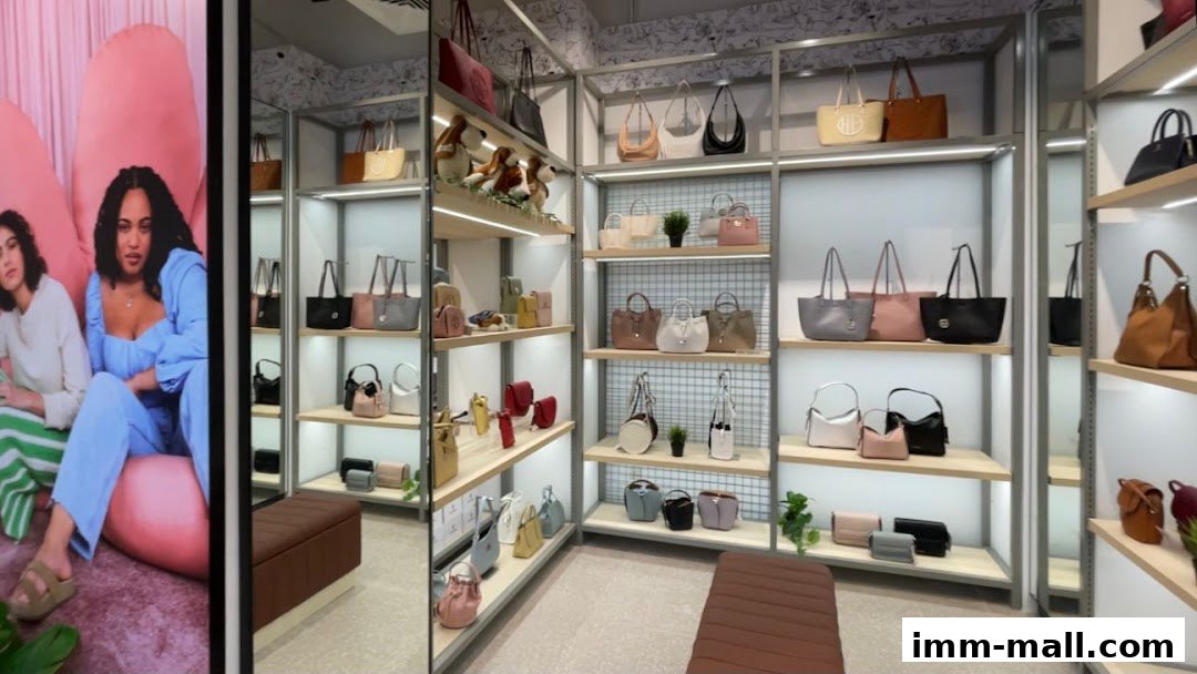 Interior view of a Hush Puppies store showcasing a variety of handbags on display shelves.