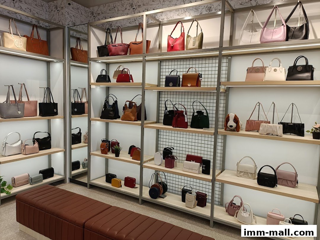 A well-lit display of various Hush Puppies handbags and accessories on shelves.
