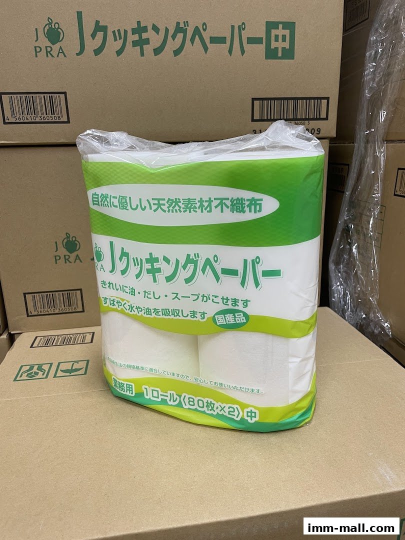 A package of J Cooking Paper, made from natural non-woven fabric, is displayed.